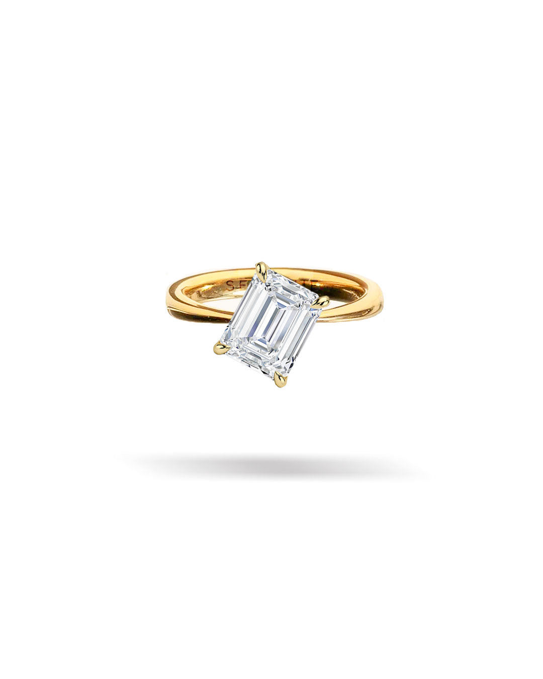 Slanted Emerald Solitaire Tapered Diamond Ring