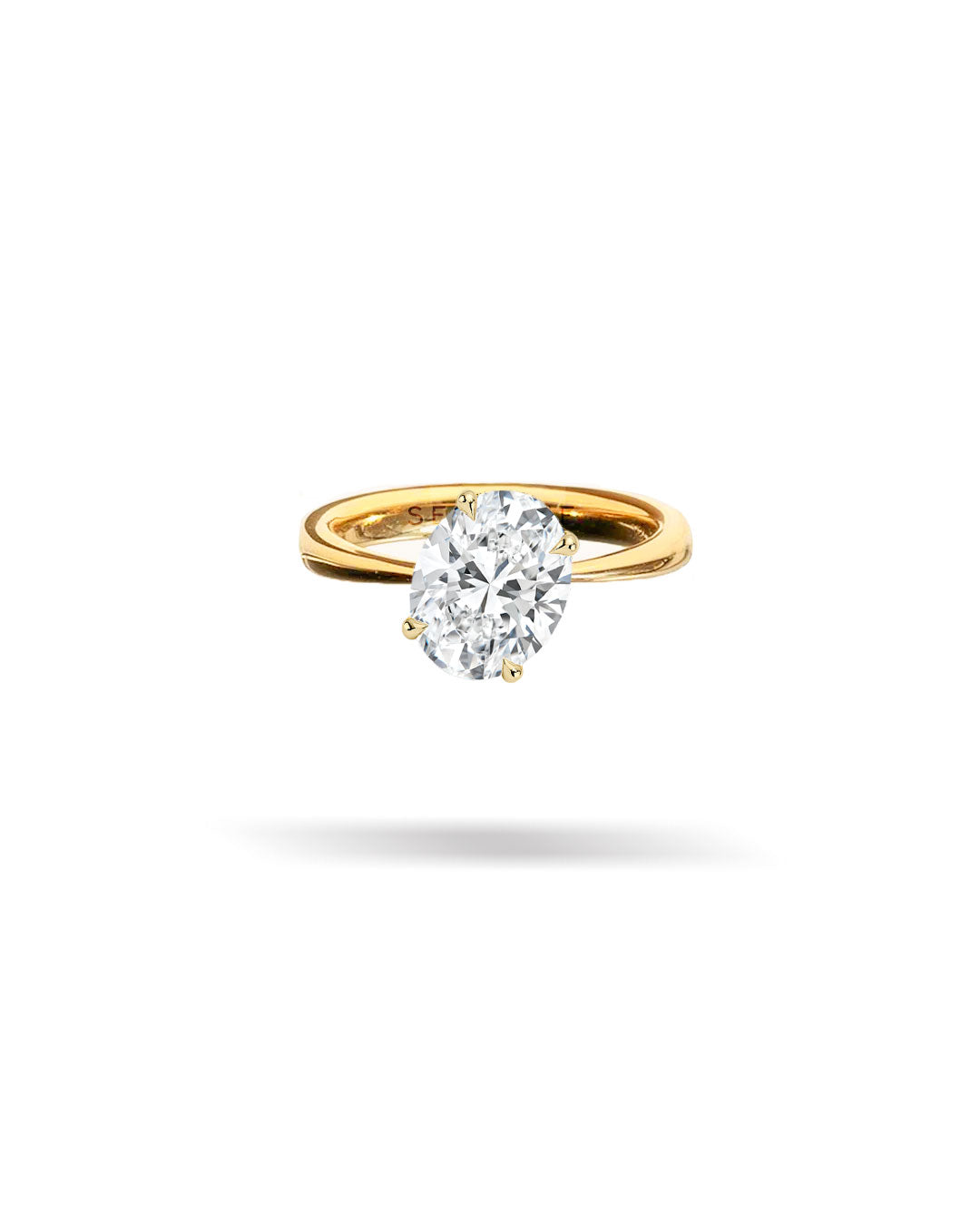 Slanted Oval Solitaire Tapered Diamond Ring