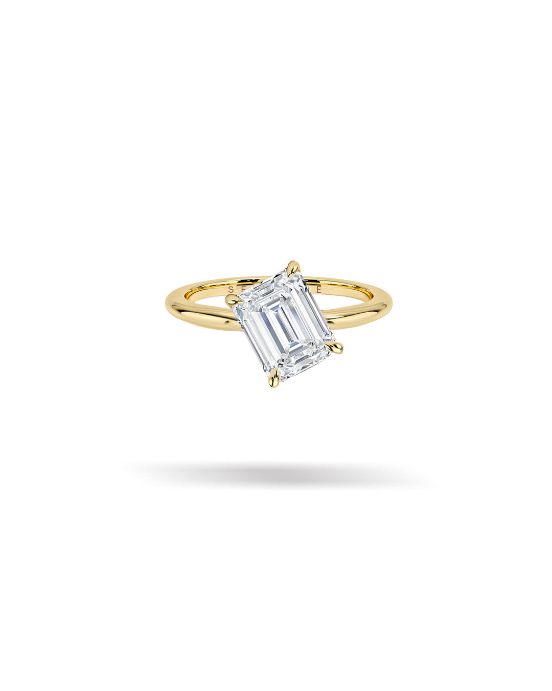 Slanted Emerald Solitaire Diamond Ring
