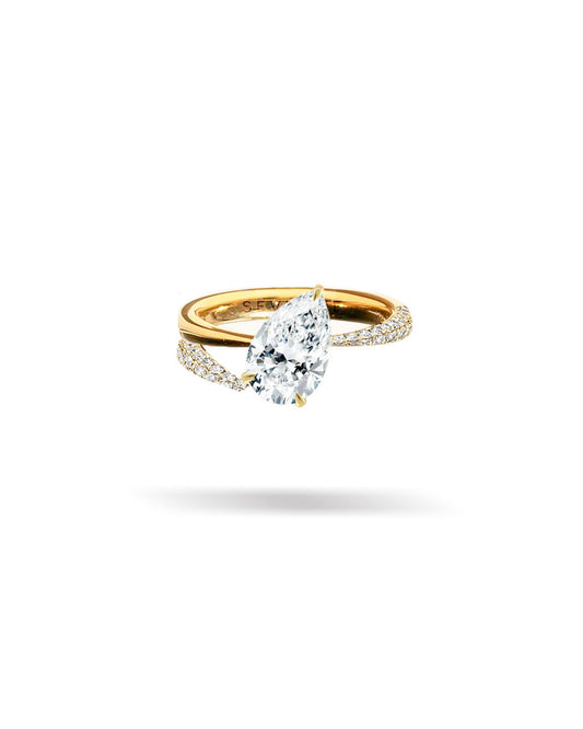 Asymmetric Slanted Pear Solitaire Tapered Diamond Ring
