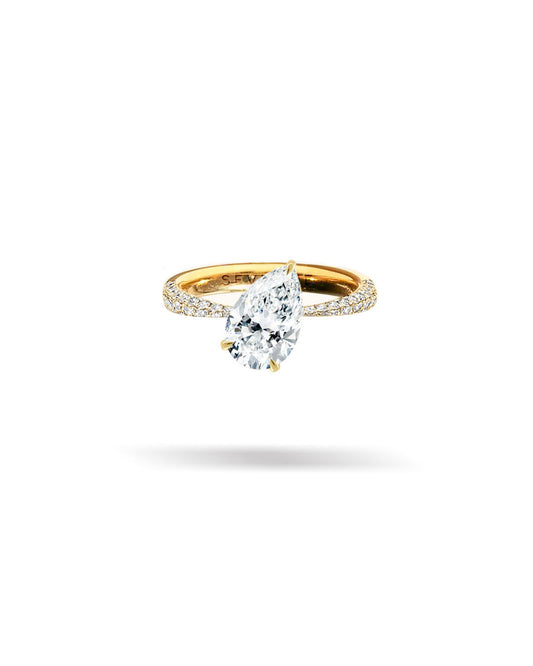 Slanted Pear Solitaire Tapered Diamond Ring